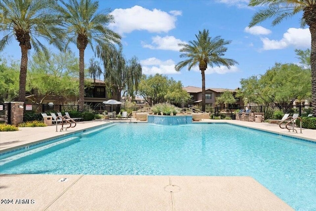 21320 N 56th St Unit 2159, Phoenix, AZ 85054 - community pool with a patio area