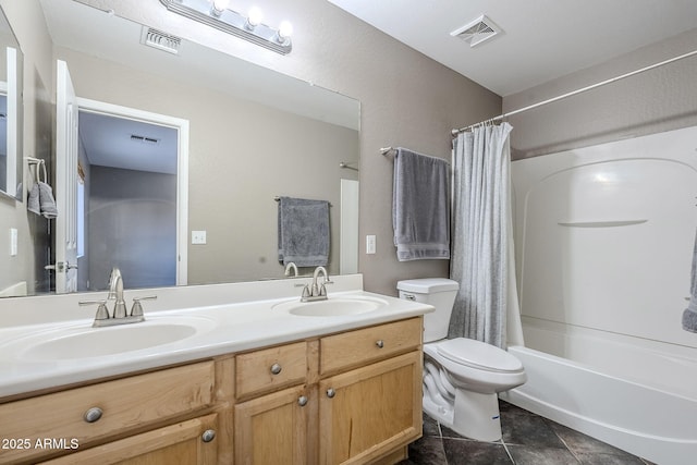 full bathroom featuring shower / bath combo, vanity, tile patterned floors, and toilet