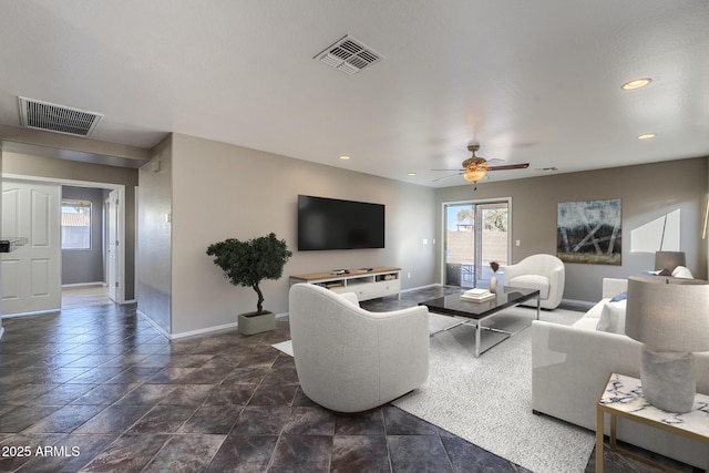 living room featuring ceiling fan