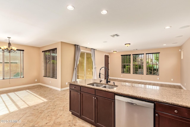 3443 E Jasper Dr, Gilbert, AZ 85296 - kitchen with dishwasher, a sink, open floor plan, dark brown cabinets, and recessed lighting