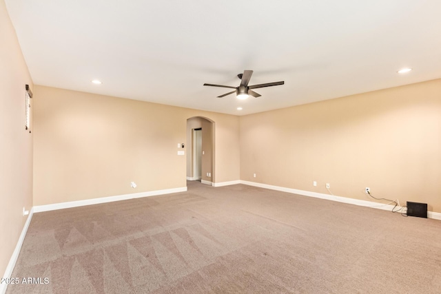3443 E Jasper Dr, Gilbert, AZ 85296 - unfurnished room with arched walkways, a ceiling fan, carpet flooring, and recessed lighting