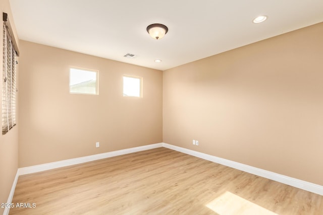 3443 E Jasper Dr, Gilbert, AZ 85296 - empty room featuring light wood-style floors, baseboards, and recessed lighting