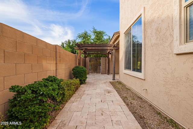3443 E Jasper Dr, Gilbert, AZ 85296 - view of patio / terrace with a fenced backyard, a pergola, and a gate