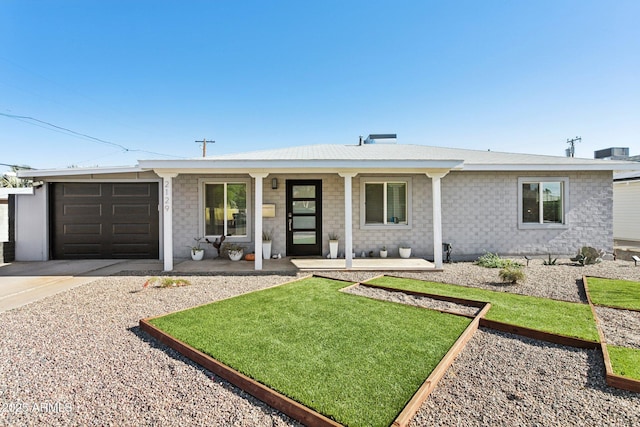 2129 W Indianola Ave, Phoenix, AZ 85015 - single story home featuring covered porch, concrete driveway, a garage, central air condition unit, and a front yard