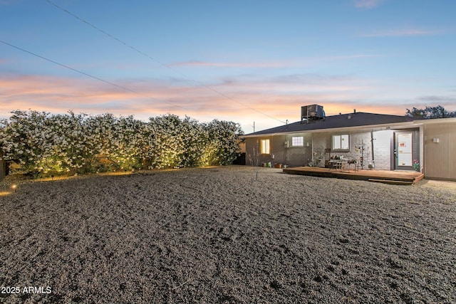 2129 W Indianola Ave, Phoenix, AZ 85015 - rear view of property featuring a deck and brick siding