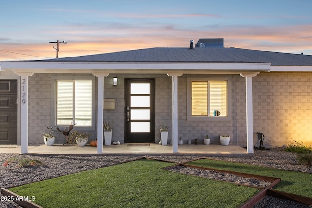 2129 W Indianola Ave, Phoenix, AZ 85015 - entrance to property with covered porch and a yard
