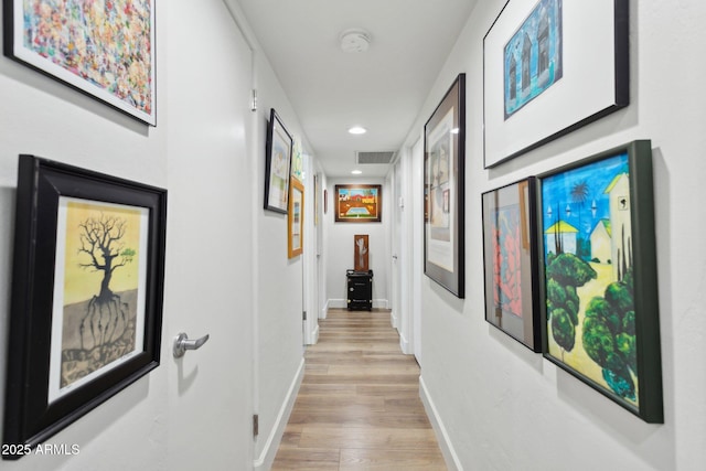 2129 W Indianola Ave, Phoenix, AZ 85015 - hall featuring light wood-style flooring, recessed lighting, and baseboards