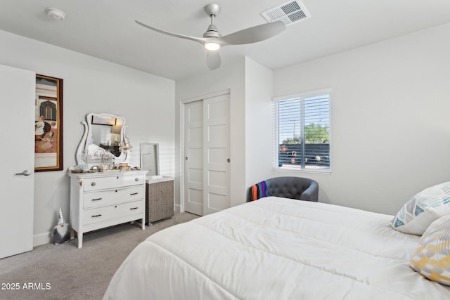 2129 W Indianola Ave, Phoenix, AZ 85015 - bedroom with light colored carpet, a ceiling fan, and baseboards