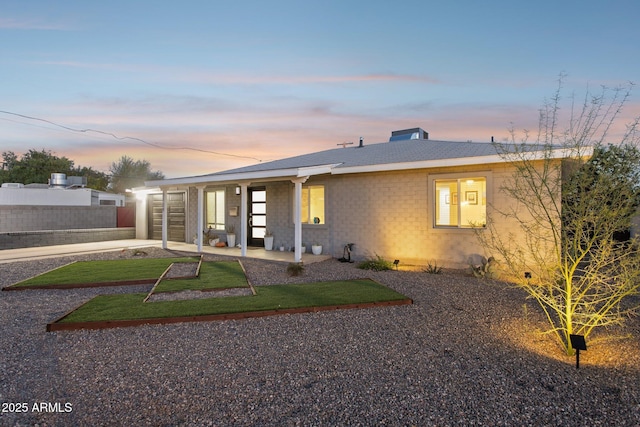 2129 W Indianola Ave, Phoenix, AZ 85015 - rear view of property featuring a garage
