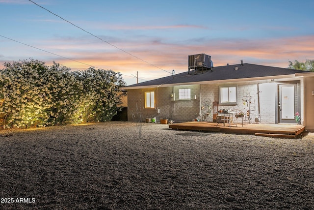 2129 W Indianola Ave, Phoenix, AZ 85015 - rear view of house featuring a deck and central AC unit