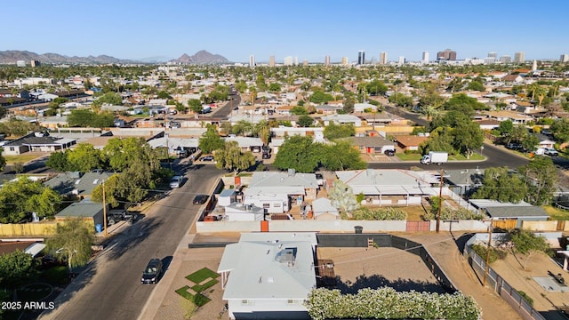 2129 W Indianola Ave, Phoenix, AZ 85015 - aerial view of property and surrounding area featuring nearby suburban area and a mountainous background