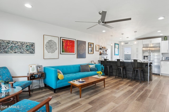 2129 W Indianola Ave, Phoenix, AZ 85015 - living room featuring ceiling fan, light wood-type flooring, and recessed lighting