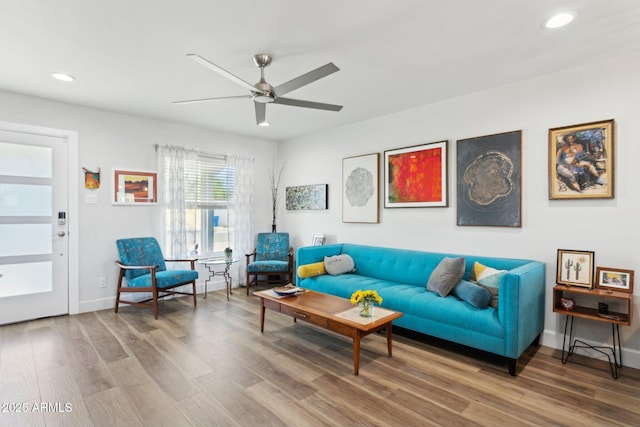 2129 W Indianola Ave, Phoenix, AZ 85015 - living area with a ceiling fan, recessed lighting, wood finished floors, and baseboards