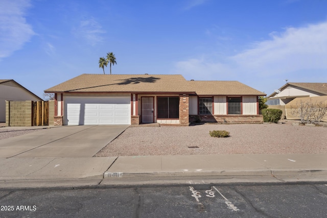 single story home with a garage