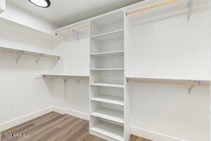 3021 N Randolph Rd, Phoenix, AZ 85014 - walk in closet with wood finished floors