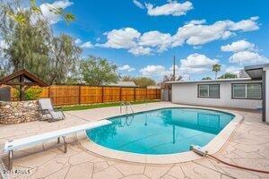 3021 N Randolph Rd, Phoenix, AZ 85014 - view of swimming pool with a fenced in pool, a fenced backyard, and a patio area