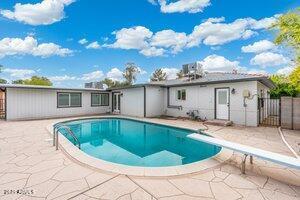 3021 N Randolph Rd, Phoenix, AZ 85014 - view of swimming pool with a fenced in pool, a patio, and fence