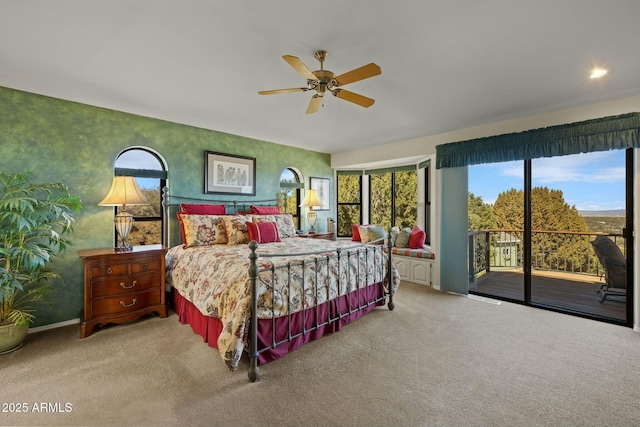 carpeted bedroom featuring ceiling fan, baseboards, access to exterior, and wallpapered walls