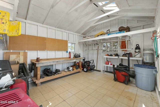 garage featuring a workshop area