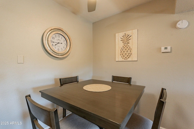 dining space featuring a ceiling fan