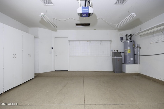 garage featuring electric water heater, visible vents, baseboards, and a garage door opener