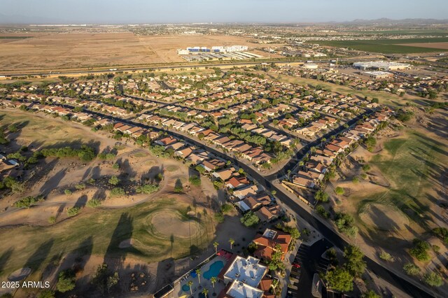 birds eye view of property with a residential view