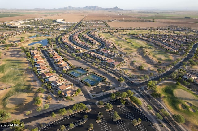 bird's eye view featuring a residential view, golf course view, and a water and mountain view