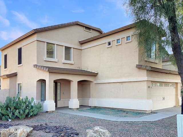 view of front of property with a garage