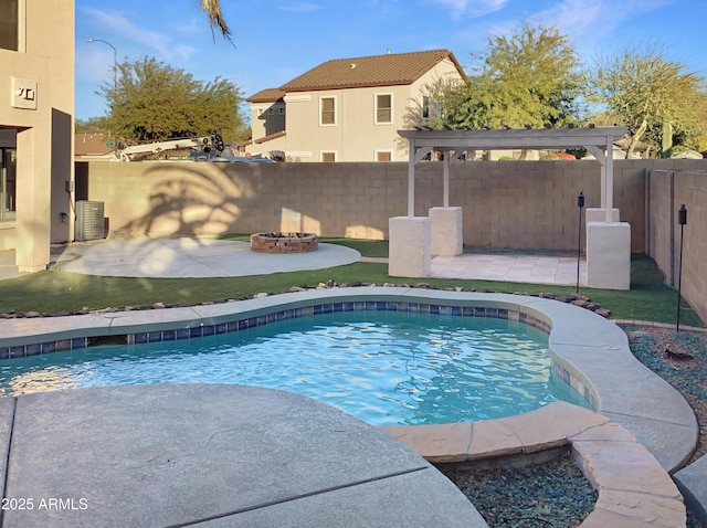 view of swimming pool featuring cooling unit and a patio area