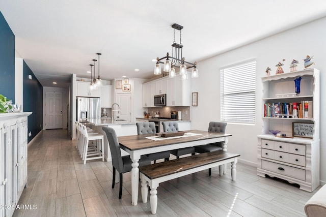 dining area featuring sink