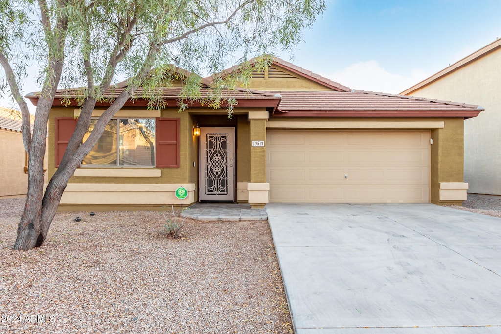 view of front of property featuring a garage