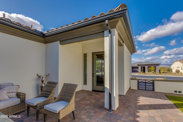 3281 Maverick Dr, Wickenburg, AZ 85390 - view of patio / terrace featuring a gate
