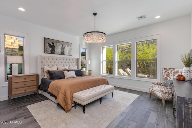 3281 Maverick Dr, Wickenburg, AZ 85390 - bedroom with a notable chandelier, dark wood-style floors, baseboards, and recessed lighting