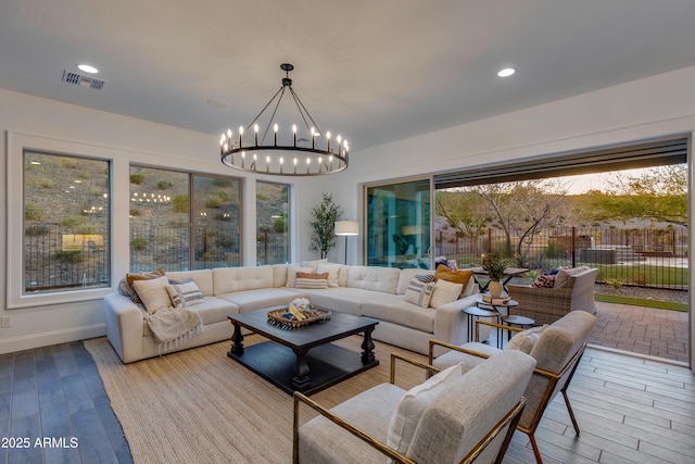 3281 Maverick Dr, Wickenburg, AZ 85390 - living area featuring visible vents, recessed lighting, a notable chandelier, and wood finished floors