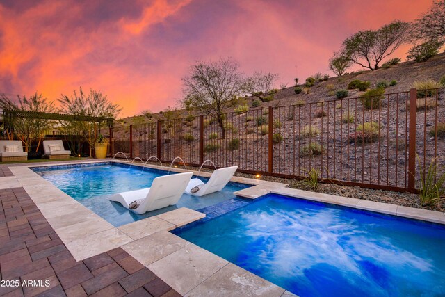 3281 Maverick Dr, Wickenburg, AZ 85390 - view of pool with a fenced in pool, a fenced backyard, a jacuzzi, an outdoor kitchen, and a patio area