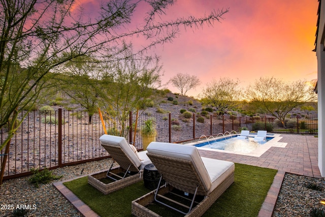 3281 Maverick Dr, Wickenburg, AZ 85390 - exterior space with a fenced backyard, a fenced in pool, and a patio area