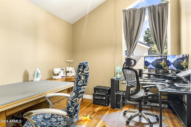 4371 E Savannah Cir, Flagstaff, AZ 86004 - office area with baseboards, wood finished floors, and lofted ceiling