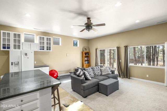 4371 E Savannah Cir, Flagstaff, AZ 86004 - living area with recessed lighting, light carpet, baseboards, visible vents, and a ceiling fan