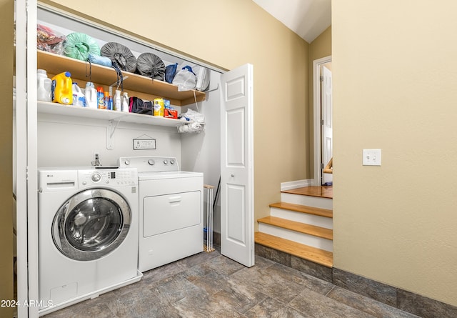 4371 E Savannah Cir, Flagstaff, AZ 86004 - laundry room featuring stone finish flooring, washer and dryer, and laundry area