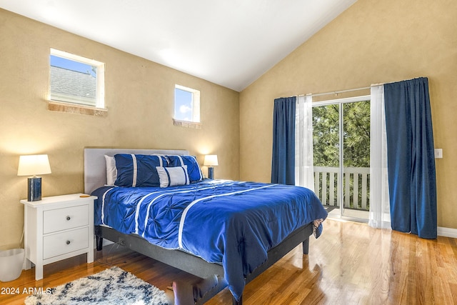 4371 E Savannah Cir, Flagstaff, AZ 86004 - bedroom with wood finished floors, access to outside, and vaulted ceiling