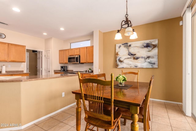 dining area featuring light tile patterned floors, visible vents, and recessed lighting