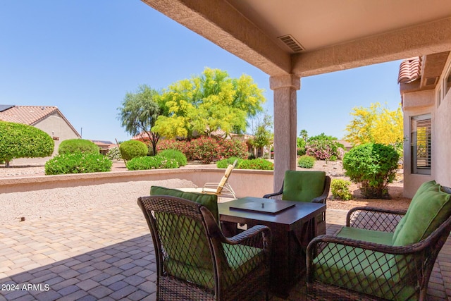 view of patio with visible vents