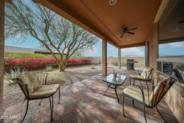 view of patio / terrace featuring grilling area and ceiling fan