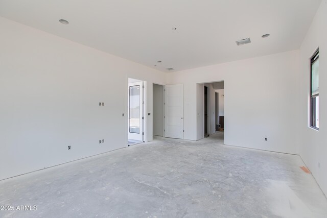 3335 W Desert Dawn Dr, Phoenix, AZ 85083 - spare room featuring concrete floors