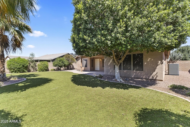 2453 E Nathan Way, Chandler, AZ 85225 - view of grassy yard featuring central AC unit and a patio