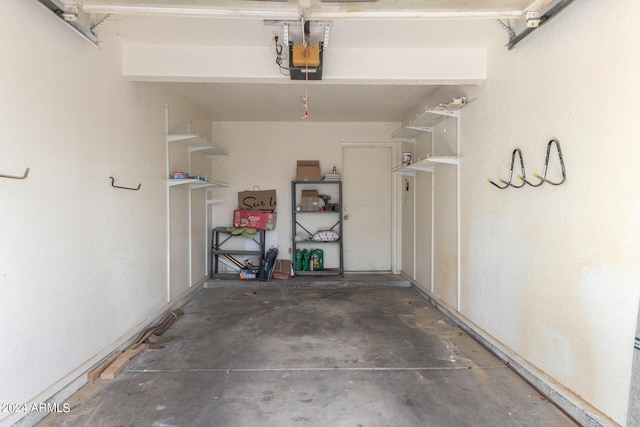 garage featuring a garage door opener