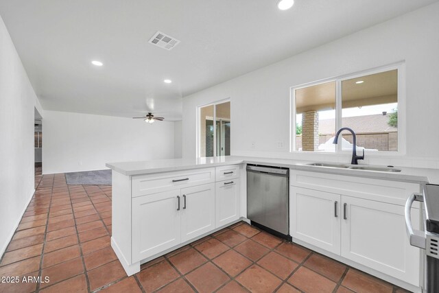 6527 W Sunnyside Dr, Glendale, AZ 85304 - kitchen featuring visible vents, dishwasher, a sink, a ceiling fan, and a peninsula