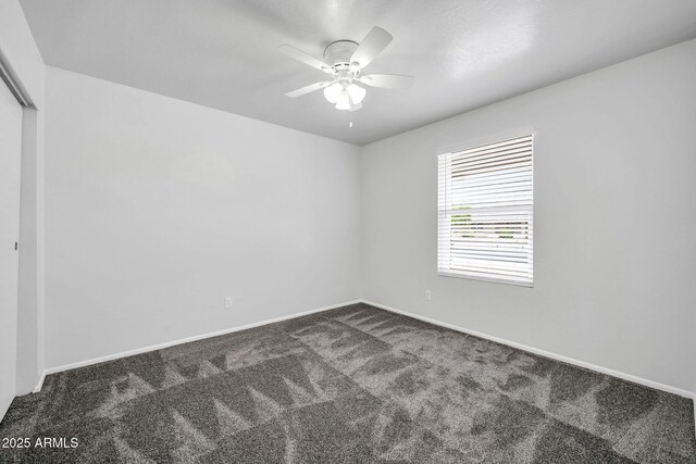 6527 W Sunnyside Dr, Glendale, AZ 85304 - unfurnished bedroom featuring a closet, baseboards, a ceiling fan, and carpet