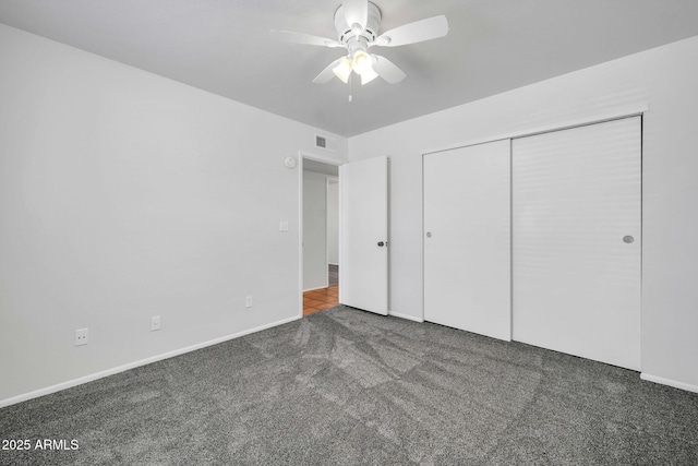 6527 W Sunnyside Dr, Glendale, AZ 85304 - unfurnished bedroom with visible vents, baseboards, a closet, a ceiling fan, and carpet flooring