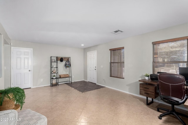 office featuring visible vents and baseboards